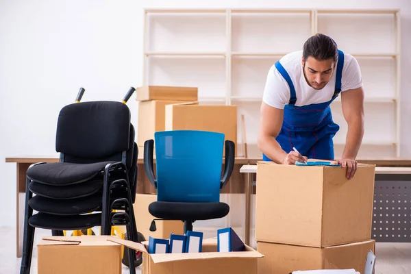 Home 15 depositphotos 413683646 stock photo young male professional mover doing